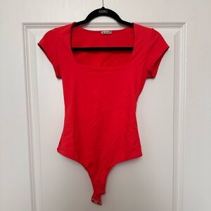 Size XS free people body suit